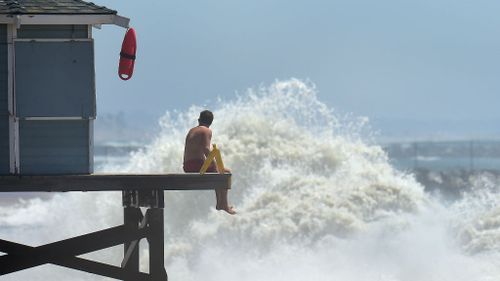 PHOTOS: huge waves, wind smashes Californian coastline as hurricane Marie passes