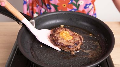 Egg cooked in the middle of a meat patty is the great burger hack