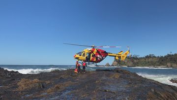 A rock fisherman has had a lucky escape after he was swept from rocks on the NSW South Coast.