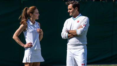 LONDON, ENGLAND - JUNE 24:  In this handout images released by Kensington Palace on June 24, 2023, Catherine, Princess of Wales and Wimbledon Champion Roger Federer talk before playing tennis on No.3 Court at The All England Lawn Tennis Club, Wimbledon, on June 8, 2023 in London, England. (Photo by Handout/Thomas Lovelock - AELTC via Getty Images)