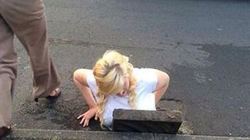 Teen stuck in drain trying to save phone