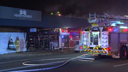 The shop front was left destroyed by the blaze. (9NEWS)