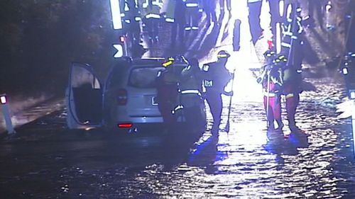 At least 12 people became trapped in floodwaters after severe thunderstorms hit Queensland's south-east. (9NEWS)