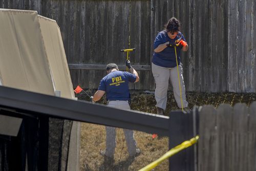 Police conducting a search of DeAngelo's Sacramento home in April. Picture: AP