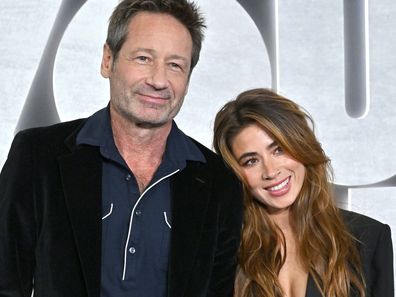 David Duchovny and Monique Pendleberry attend the Los Angeles Premiere of Netflix's You People at Regency Village Theatre on January 17, 2023 in Los Angeles, California.