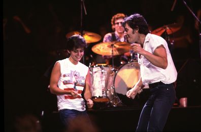 Bruce Springsteen and Courteney Cox at the filming of the video for Dancing in the Dark on 6/27/84 in Minneapolis, Mn. in Various Locations, (Photo by Paul Natkin/WireImage)