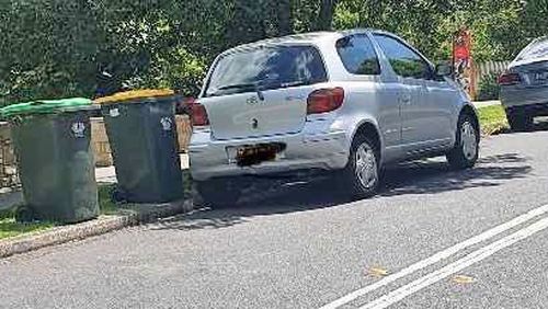 A photo provided by Revenue NSW which shows the car Cherie Frankel was renting parked illegally too close to the road's centre double line. 
