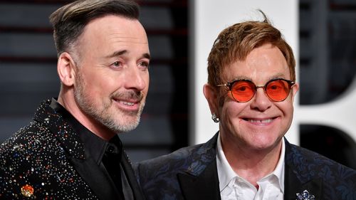 David Furnish and Elton John attend the 2017 Vanity Fair Oscar Party hosted by Graydon Carter at Wallis Annenberg Center for the Performing Arts on February 26, 2017 in Beverly Hills, California.