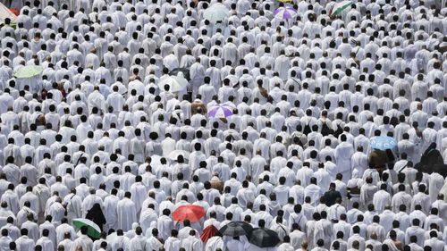 Muslim worshippers pray during the Hajj pilgrimage outside Namrah Mosque in Arafat. (AAP)