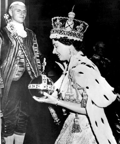 FILE - In this June 2, 1953 file photo, Britain's Queen Elizabeth II wearing the bejeweled Imperial Crown and carrying the Orb and Scepter with Cross, leaves Westminster Abbey, London, at the end of her coronation ceremony. Queen Elizabeth II, Britains longest-reigning monarch and a rock of stability across much of a turbulent century, has died. She was 96. Buckingham Palace made the announcement in a statement on Thursday Sept. 8, 2022. (AP Photo/File)