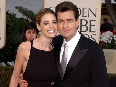 Denise Richards and Charlie Sheen arrive for the Golden Globe Awards at the Beverly Hilton Hotel in Beverly Hills, California January 20, 2002. 