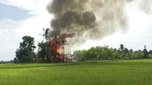 fires occur in Gawdu Zara village, northern Rakhine state, Myanmar, Thursday, Sept. 7. (AAP)