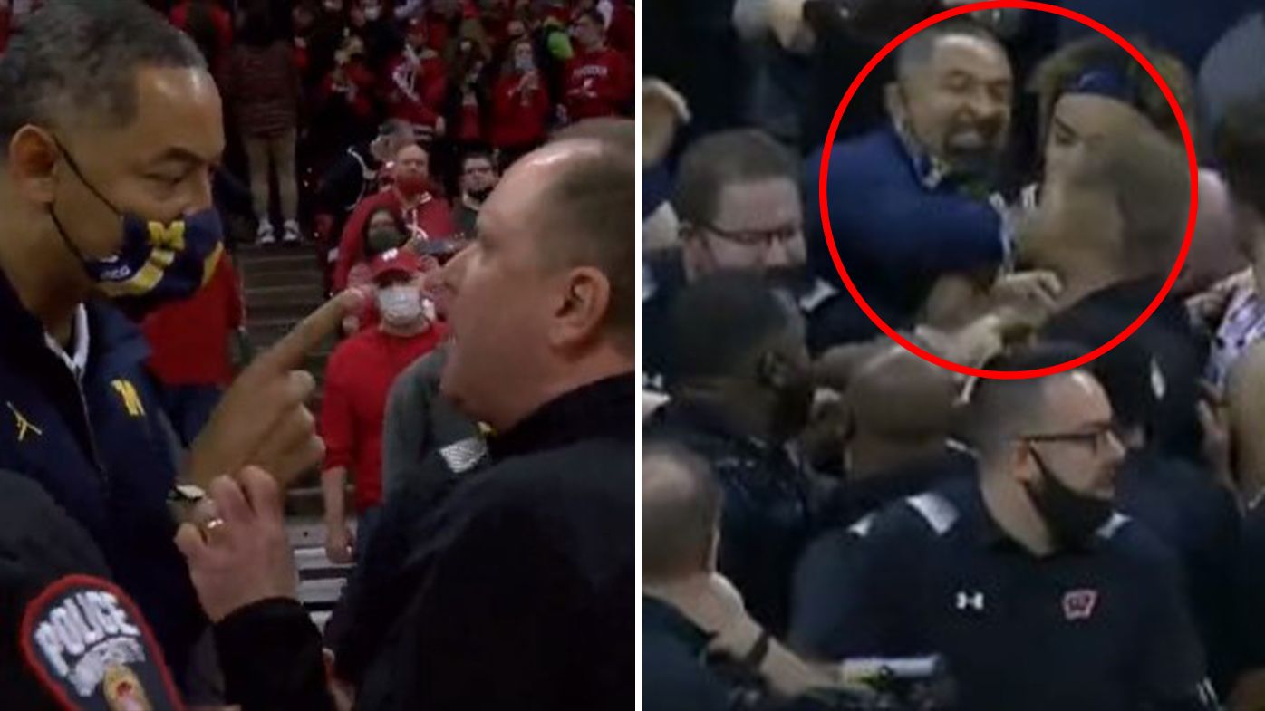 Mayhem erupts as US college basketball coach hits opposition assistant