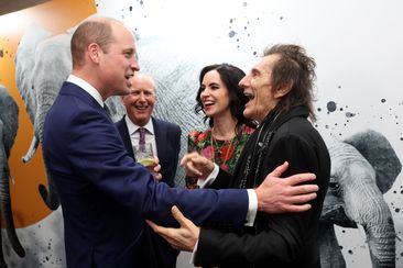 Prince William, Prince of Wales, Founder and CEO of Tusk Trust Charlie Mayhew OBE and Tusk Ambassadors Sally Wood and Ronnie Wood attend the 2023 Tusk Conservation Awards at The Savoy Hotel on November 27, 2023 in London 