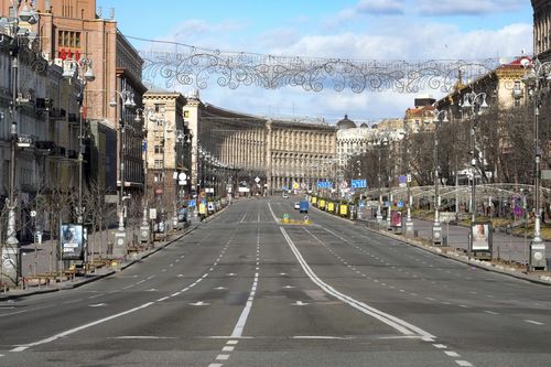 A view of Khreshchatyk, the main street, empty, due to curfew in the central of Kyiv, Ukraine, Sunday, Feb. 27, 2022.