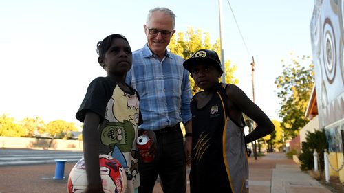 Prime Minister Malcolm Turnbull speaks with local kids at Tennant Creek, in the Northern Territory (AAP)