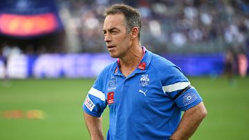 PERTH, AUSTRALIA - MARCH 25: Alastair Clarkson, Senior Coach of the Kangaroos looks on during the 2023 AFL Round 02 match between the Fremantle Dockers and the North Melbourne Kangaroos at Optus Stadium on March 25, 2023 in Perth, Australia. (Photo by Daniel Carson/AFL Photos)
