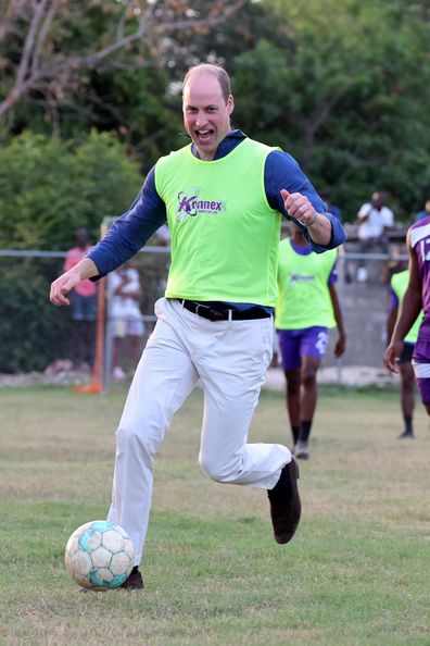 Prince William, Duke of Cambridge is seen playing soccer during a visit to Trench Town, the birthplace of reggae music, on day four of the Platinum Jubilee Royal Tour of the Caribbean on March 22, 2022 in Kingston, Jamaica 