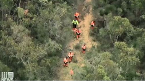 Members of the local SES and police are out searching dense bushland for the toddler.