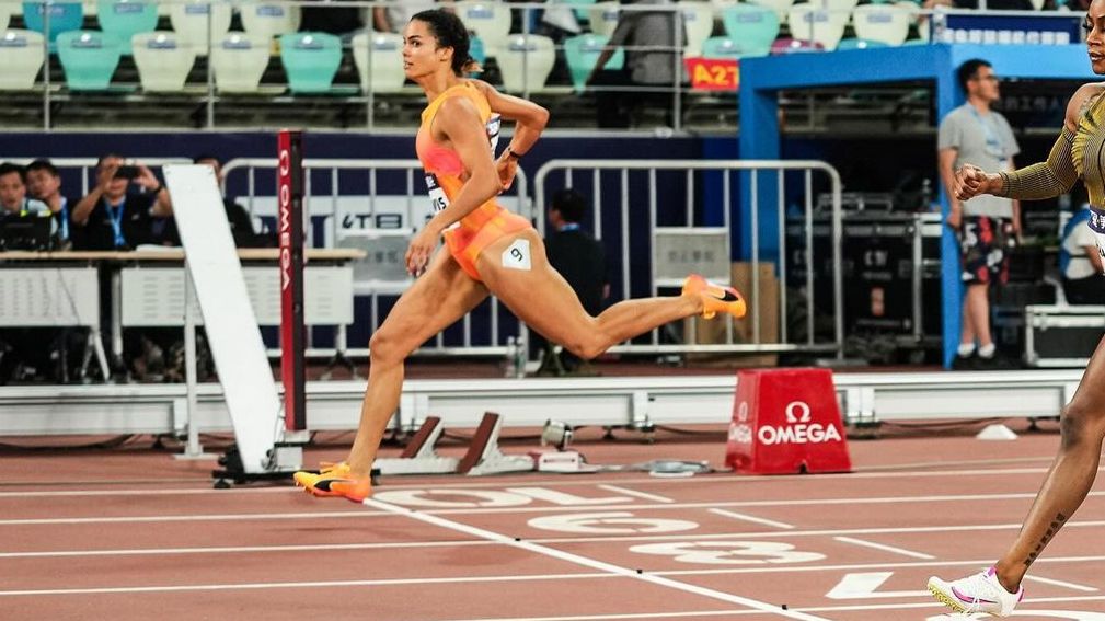 Torrie Lewis crosses the line to win the 200m event at the Xiamen Diamond League meet.