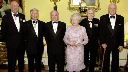 Queen Elizabeth with present and former Australian Prime Ministers, left to right, Malcolm Fraser, Bob Hawke, the present PM John Howard, John Gorton and Gough Whitham, before a dinner at Buckingham Palace in 2000.