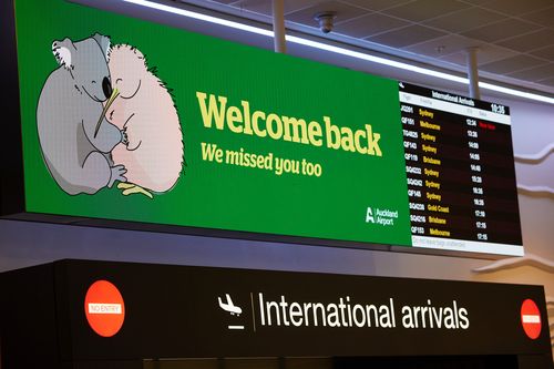 A welcome back sign features a koala and a kiwi at Auckland International Airport in Auckland, New Zealand, on Monday, April 19, 2021. Australia and New Zealand on Monday started their first quarantine-free flights since the pandemic began, after they successfully halted Covid-19 transmissions from spreading through their nations. Photographer: Brendon O'Hagan/Bloomberg