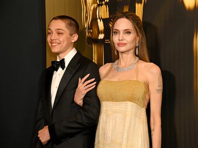 Knox Jolie-Pitt and Angelina Jolie attend the 2024 Governors Awards at Dolby Theatre on November 17, 2024 in Hollywood, California.  