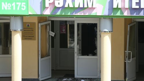 KAZAN, RUSSIA  MAY 11, 2021: Shattered glass by the entrance to school No 175 where two attackers opened fire; at least one teacher and eight students are reported dead. Yegor Aleyev/TASS (Photo by Yegor Aleyev\TASS via Getty Images)