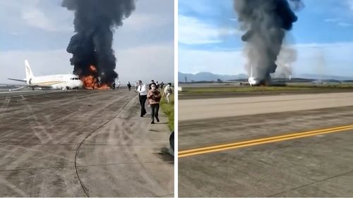 Residents were seen fleeing from the plane as flames roared behind them.