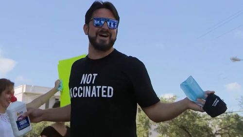 A man wearing a 'Not Vaccinated' t-shirt was among those protesting the COVID-19 vaccine in the US.