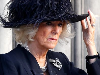 EDINBURGH, UNITED KINGDOM - SEPTEMBER 12: Camilla, Queen Consort attends a Service of Thanksgiving for the life of Queen Elizabeth II on September 12, 2022 in Edinburgh, Scotland. King Charles III joins the procession accompanying Her Majesty The Queen's coffin from the Palace of Holyroodhouse along the Royal Mile to St Giles' Cathedral. The King and The Queen Consort, accompanied by other Members of the Royal