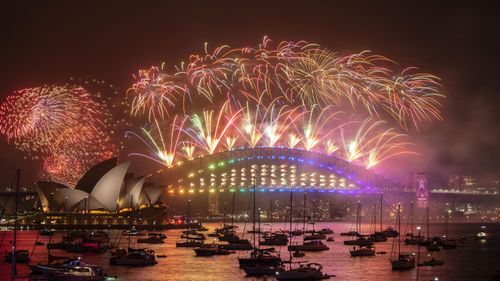 Sydney NYE 2019. The midnight New Year's Eve fireworks on Sydney Harbour, viewed from Mrs Macquarie's Chair. 1st January 2020