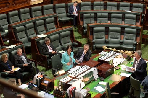 Sleepy looking MPs were caught yawning during the debate. 