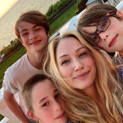 Sarah Wynter with her three sons. 