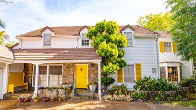 The bright yellow door of Betty White's California home is up for auction.