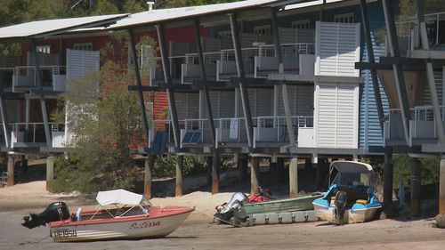 Marketed as a once-in-a-lifetime bargain, apartments on island resort Couran Cove are being sold for prices as low as $50,000 but they do come with a catch.