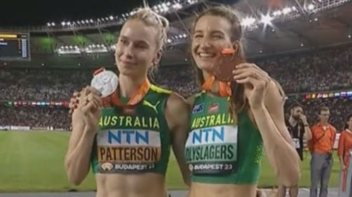 Eleanor Patterson and Nicola Olyslagers with their medals after the women&#x27;s high jump final at the World Athletics Championship in Budapest.