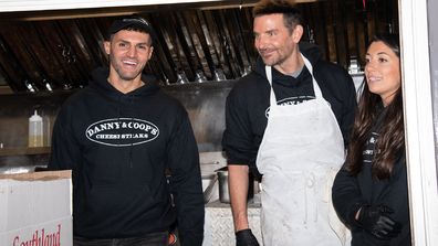 Bradley Cooper is seen serving with a charity food truck on December 6, 2023 in New York, New York. 