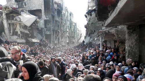 Yarmouk is a mostly Palestinian refugee camp in Damascus, the capital of Syria, which receives little to no food or aid. (AAP)