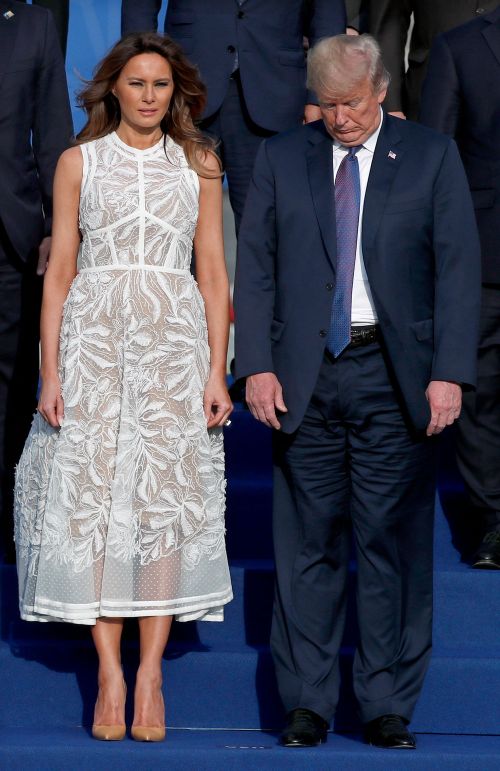 Mr Trump with wife Melania at the NATO summit. (AAP)