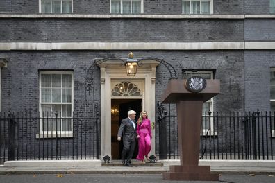 Outgoing British Prime Minister Boris Johnson arrives with his wife Carrie to speak outside Downing Street in London, Tuesday, September 6, 2022 