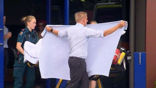 One of the boys is assisted by paramedics. (Image: 9NEWS)
