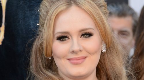 Adele's toddler son wins five-figure pay out in privacy claim over paparazzi shots