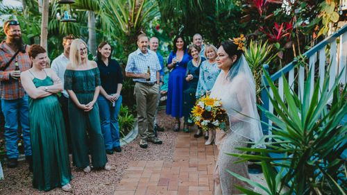 Amelia Rankin on her wedding day just six months ago- the same spot is now under water.