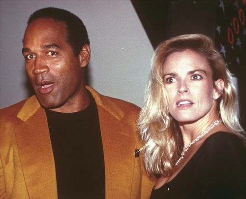 FILE - O.J. Simpson and his wife, Nicole Brown Simpson, arrive for the opening of the Harley-Davidson Cafe in New York on Oct. 19, 1993. 