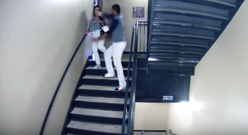 The footage shows Vasquez walk the woman into the stairwell before striking her several times. (Supplied)