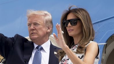 US President Donald Trump and First Lady Melania Trump board Air Force One prior to departing Paris Orly Airport on July 14, 2017. (AFP)