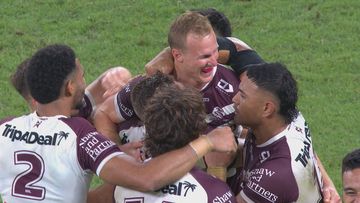 Daly Cherry-Evans and his Manly Sea Eagles teammates celebrating after he kicked the winning field goal to defeat the Cowboys in Townsville.