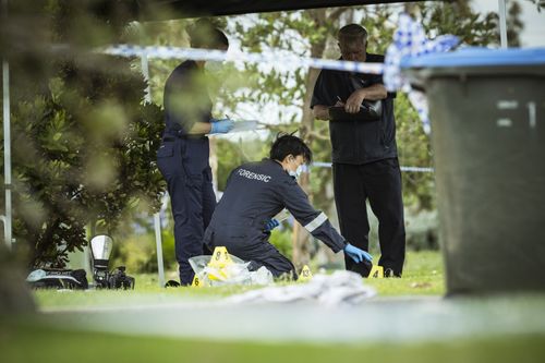 Forensic police investigate at the scene in Werribee South where the dispute took place.