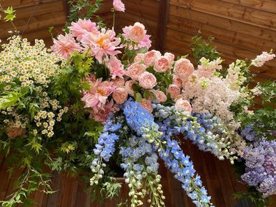 In 12 months you can change a lot of your mind about details such as flower arrangements.